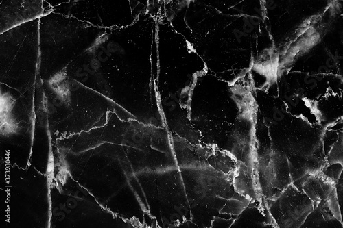 White pattern natural detailed structure of black marble texture for interior or product design. Abstract dark background.