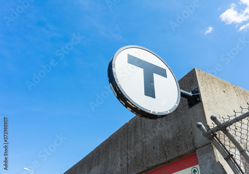 Boston MBTA sign for the Red Line T stop at UMASS Boston. 