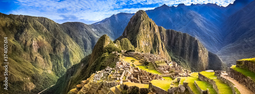 Morning Panorama View of Hidden Saced Inca City Machu Picchu, Aguas Calientes, Cusco Peru - UNESCO World Heritage Pano