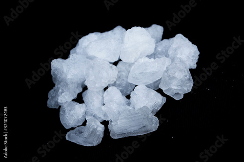 Potassium nitrate isolated on black background.