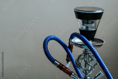 New generation electronic hookah or shisha. Modern hookah does not required charcoal can be charged and has internal battery. 