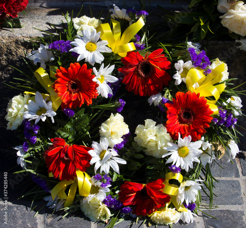 Beautiful colorful fresh floral wreaths for Anzac Day memorial celebrations 25th April in Bunbury ,Western Australia to honor and remember those who gave their lives in battles "lest we forget."