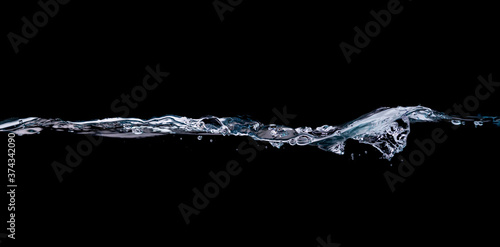 Water drinking, Water wave splash isolated black background. 