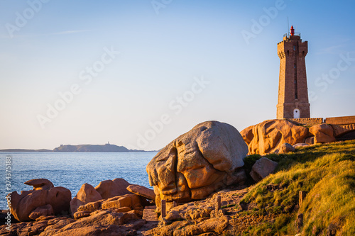 Old lighthouse at the Cote de Granit Rose at the coast of Brittnay, France