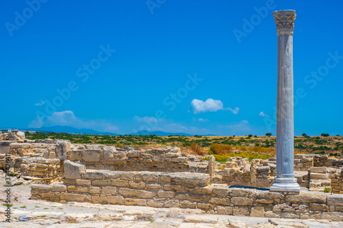 Cyprus. Paphos Archaeological Museum. Open air museum in the city of Paphos. Remains of the walls of the ancient city. Colon on the background of blue sky. Ancient civilization. Cyprus Travel Guide