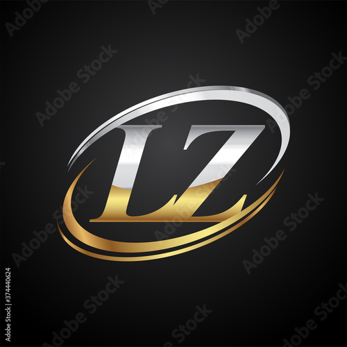 initial letter LZ logotype company name colored gold and silver swoosh design. isolated on black background.