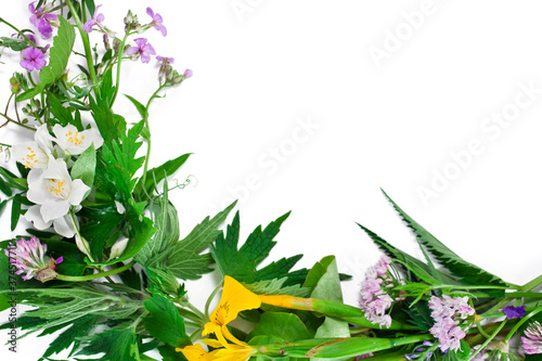 Beautiful flower garland with colorful flowers isolated on a white background. Midsummer celebration concept, summer decoration.