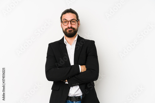 Young caucasian business man isolated on a white background unhappy looking in camera with sarcastic expression.