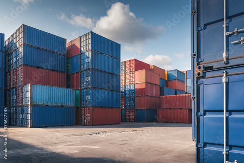 Stack of Containers Cargo Ship Import/Export in Harbor Port, Cargo Freight Shipping of Container Logistics Industry. Nautical Transport Distribution Yard, Business Commercial Dock and Transportation.