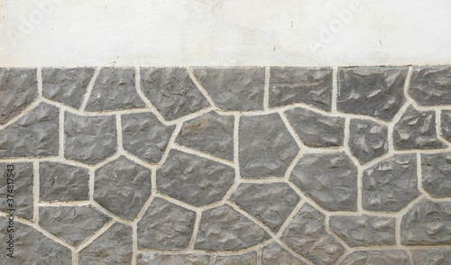 Pared de piedra con formas geométricas