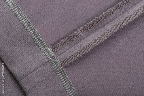 details of clothing, the seam is made on a sewing machine, the sections are processed with threads