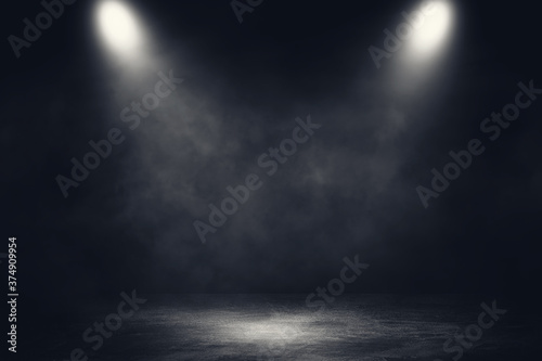 Empty space of Studio dark room concrete floor grunge texture background with spotlight and white smoke.