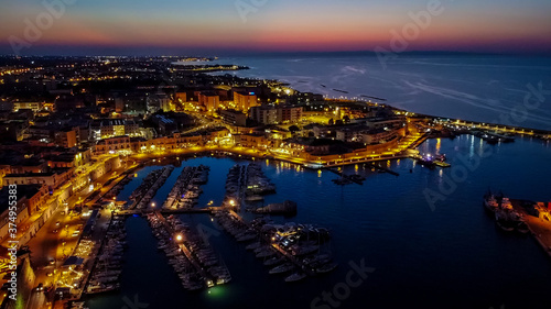 Aerial view of the port of Bisceglie at night - Historic marina in the south of Italy, in the region of Apulia, near the Adriatic Sea