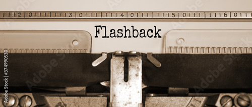 Word 'flashback' typed on retro typewriter. Sepia effect. Business concept.