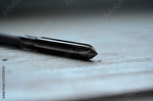 Photo of metal reamer on the table