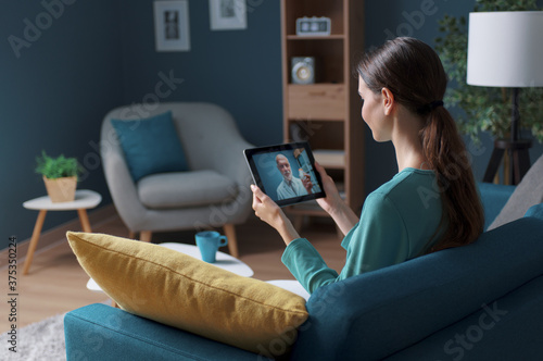 Woman having a video call with her doctor