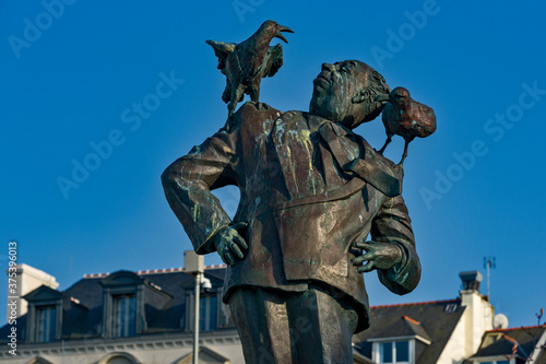 a statue of Alfred Hitchcock is erected on the beach in Dinard, Brittany, France