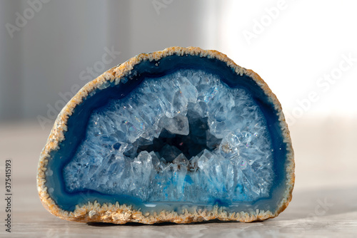 Geode with crystals of light-blue color. Quartz geode with transparent crystals. .