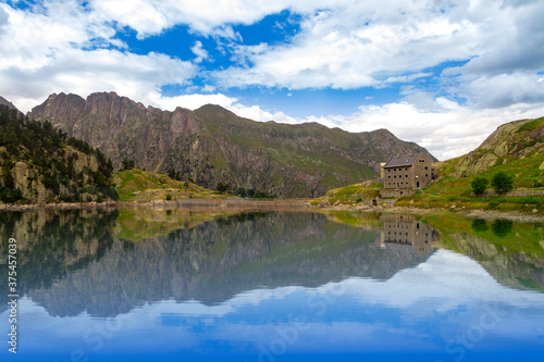 La Restanca Refuge and Lake in Valle de Aran. Aigüestortes National Park and San Mauricio Lake, Spain.