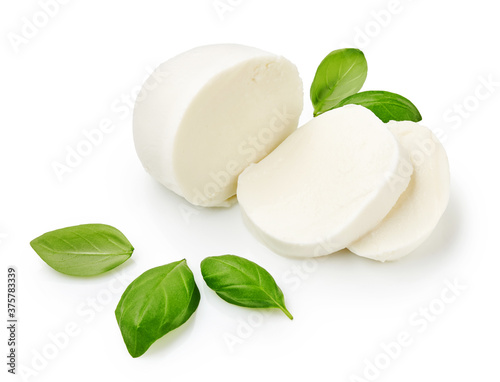 Pieces of mozzarella Buffalo cheese with basil leaves. Sliced cheese isolated on white background.