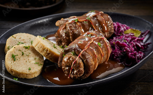 Serving of traditional beef roulade in gravy