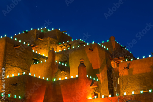 Traditional Farolitos on Adobe Walls at Christmas, Santa Fe, New Mexico,USA