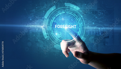 Hand touching FORESIGHT button, modern business technology concept