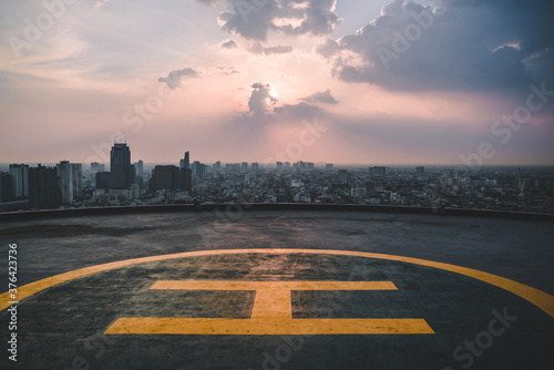 Helipad sunset Bangkok, Thailand, rooftop helicopter, top of the building, skyline, helicopter landing area in the city