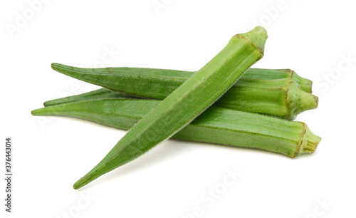 Fresh raw okra isolated on white background, horizontal with copy space