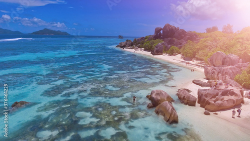 Amazing beach of Anse Source Argent in La Digue, Seychelles from drone