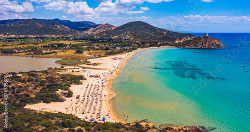 Panorama of the wonderful beaches of Chia, Sardinia, Italy. View of beautiful Chia bay and wonderful beaches, Sardinia island, Italy. Beautiful sea and bay on Su Guideu beach, Sardinia island, Italy