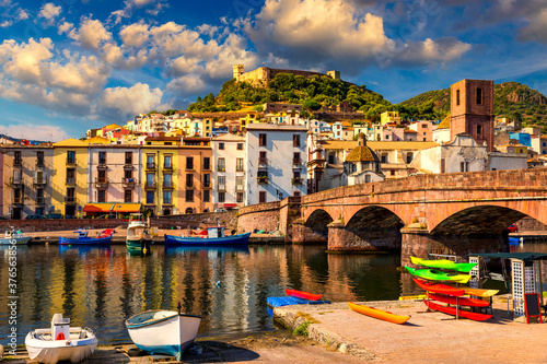 Beautiful view of Bosa town, Sardinia island, Italy. Travel destination. Bosa town with Ponte Vecchio bridge across the Temo river. Marvelous morning view of Sardinia island, Italy, Europe.