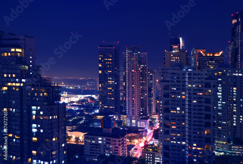 Fantastic Aerial View of Downtown Bangkok with Skyscrapers at Night in Deep Blue Color