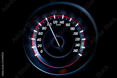 100 Kilometers per hour,light with car mileage with black background,number of speed,Odometer of car.