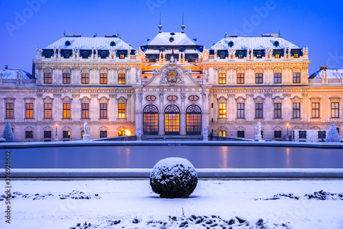 Vienna, Austria - Winter snowy night at Belvedere, travel landscape.