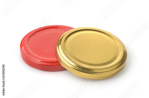 Two metal jar lids