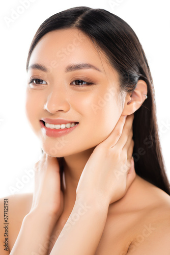 Portrait of young asian woman touching neck isolated on white