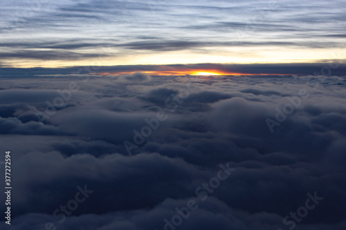 soft and beautiful clouds from above at sunrise, nature at it's best