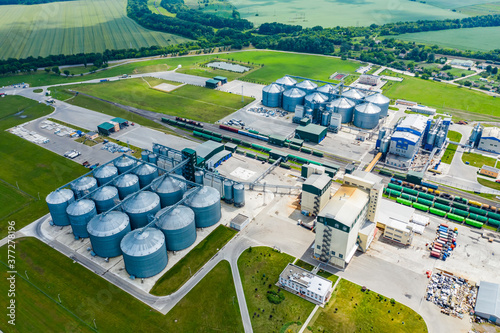 Production of sustainable fuel called bio gas. New factory in field. View from above. Ecological production.