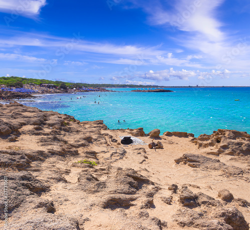 Punta della Suina beach in Salento, Apulia. Italy. It's surrounded by the Mediterranean scrub and by pine forest, boasts two small sandy bays and a small islet, which is almost separated by coast.