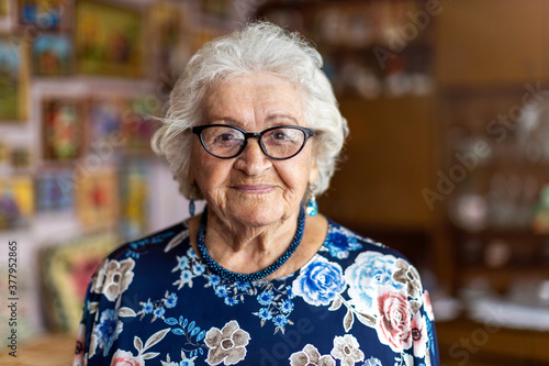 Portrait of an elderly woman at her home 