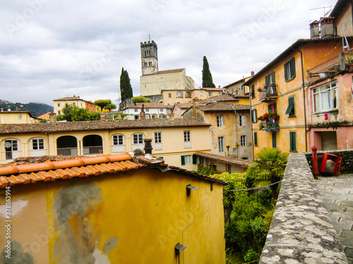 View of narrow street in old town of Barga a medieval hilltop town in Tuscany, Garfagnana, Italy, Europe