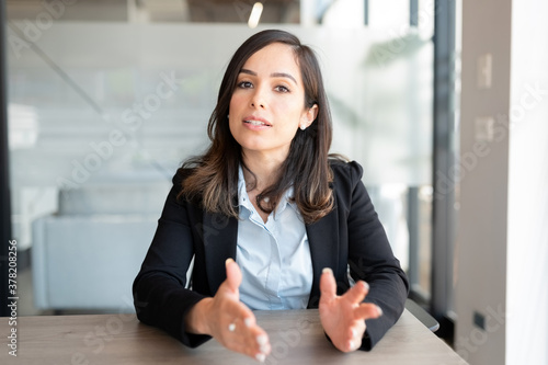 Businesswoman talking over video call