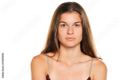 Woman without make up, isolated on white