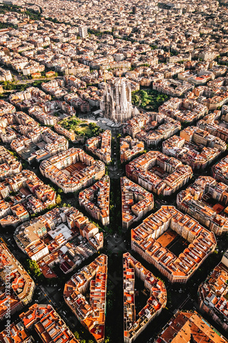 Aerial view of the residential Eixample district of Barcelona, with the Sagrada Familia, Designed by Catalan architect Antoni Gaudi