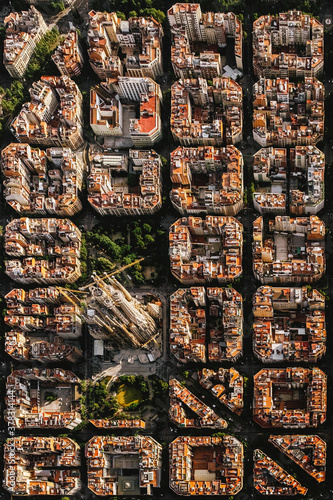 Aerial view of the residential Eixample district of Barcelona, with the Sagrada Familia, Designed by Catalan architect Antoni Gaudi
