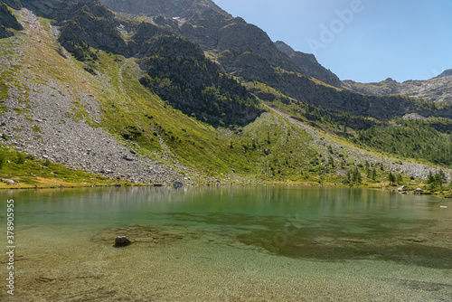 Morgex (Aosta), the wonderful Lake of Arpy, a mirror of water of glacial origin set in a beautiful alpine setting.