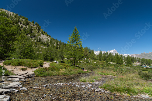 Morgex (Aosta), the wonderful Lake of Arpy, a mirror of water of glacial origin set in a beautiful alpine setting.