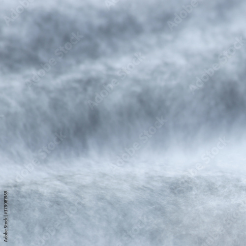 Waves of white water at Myllykoski rapids at Lohja, Finland. 