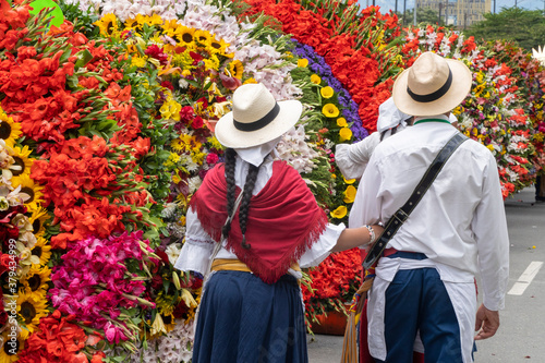 Medellin, Antioquia, Colombia. August 11, 2019: Peasants near the silletas in the Silleteros Parade